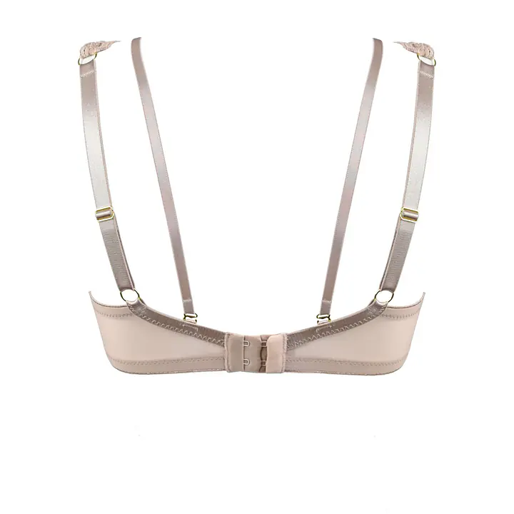 Biustonosz o kroju bralette, miękki z fiszbinami.
Miseczki wykonane zostały z siatki pokrytej bogatą koronką. W dekolcie znajduje się odpinany straps przechodzący na plecy.
Konstrukcja lekka, idelalna na lato, kształtuje biust w naturalny sposób.
Obwód z siatki, model nie posiada bocznej fiszbiny.
Skład surowcowy: 85% Poliamid, 10% Elastan, 5% Poliester.