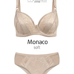 Niebanalny biustonosz Monaco  To miękki biustonosz typu soft z głęboką miseczką, który perfekcyjnie modeluje biust, zapewniając naturalny kształt i subtelne uniesienie. Transparentna koronka w klasycznej czerni dodaje zmysłowości, a szerokie ramiączka gwarantują wygodę nawet przy większym rozmiarze. Regulowane ramiączka i klasyczne zapięcie na haftki pozwalają na idealne dopasowanie do sylwetki.
Biustonosz Monaco to połączenie ponadczasowego stylu, komfortu i wyrafinowanego designu – idealny na każdą okazję
Konstrukcja MS9 Monaco
Skład: 85% Poliamid, 10% Elastan, 5% Poliester.