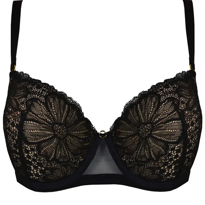 Biustonosz Julia Full Cup 19230 Black Mediolano to elegancka bielizna zaprojektowana z myślą o kobietach z średnim biustem, które cenią komfort i wyjątkowy styl. Miseczki typu full cup wykonane zostały z beżowej pianki pokrytej finezyjną, czarną koronką o kwiatowym wzorze. Dzięki wyjmowanym wkładkom push-up możesz sama zdecydować, jak mocny efekt uniesienia i modelowania biustu chcesz uzyskać. Wyższy mostek oraz dobrze przemyślana konstrukcja zapewniają doskonałą stabilizację. Obwód z elastycznej siateczki i koronki, bez bocznych fiszbin, gwarantuje wygodę nawet przy długim noszeniu. Regulowane ramiączka i zapięcie na haftki zapewniają idealne dopasowanie do sylwetki. To doskonały wybór na co dzień i specjalne okazje.
Skład surowcowy: 85% Poliamid, 10% Elastan, 5% Poliester

Skład surowcowy: 85% Poliamid, 10% Elastan, 5% Poliester
 